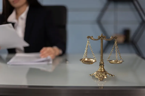 Criminal defense attorney and scales of justice